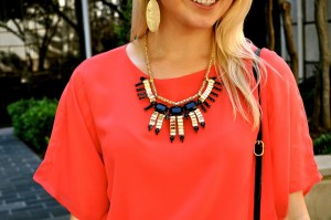 red dress statement necklace