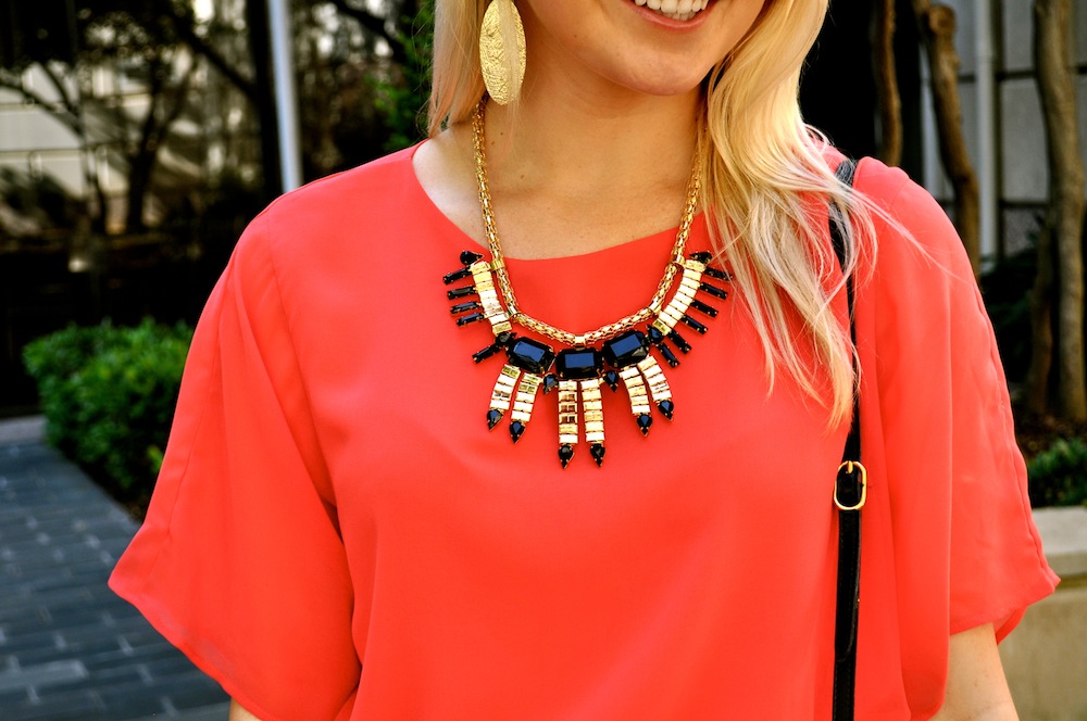 red dress statement necklace