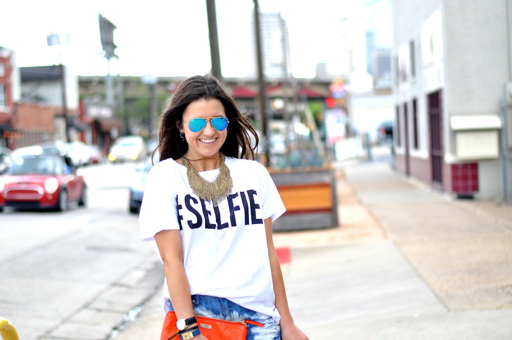 selfie shirt jean shorts