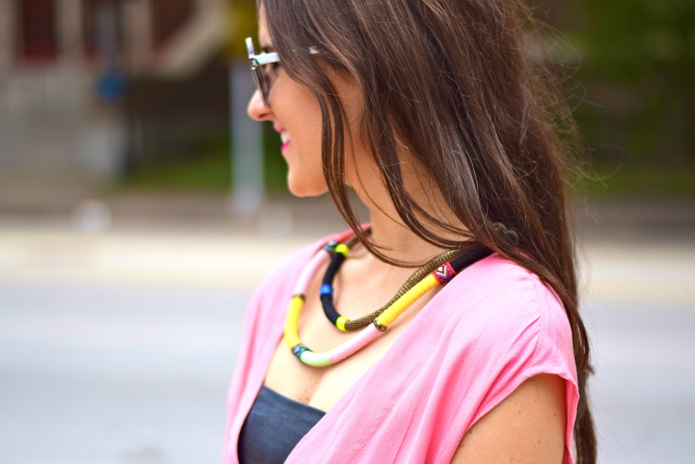 pink romper and leather bandeau
