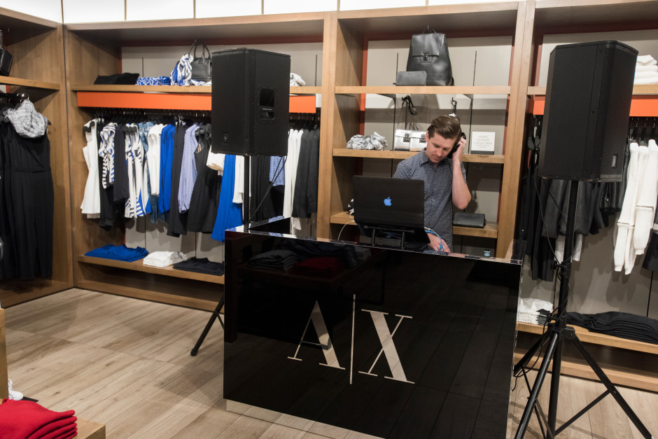 DJ Blake Ward enjoy the opening of the new Armani Exchange in Dallas, Texas on September 24, 2015.