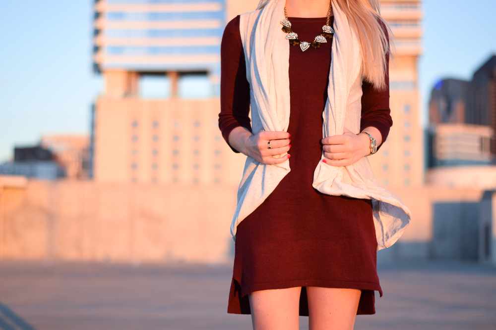 beige vest red sweater dress