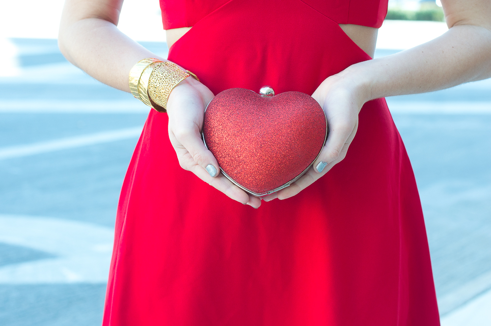 red glitter heart-shape clutch