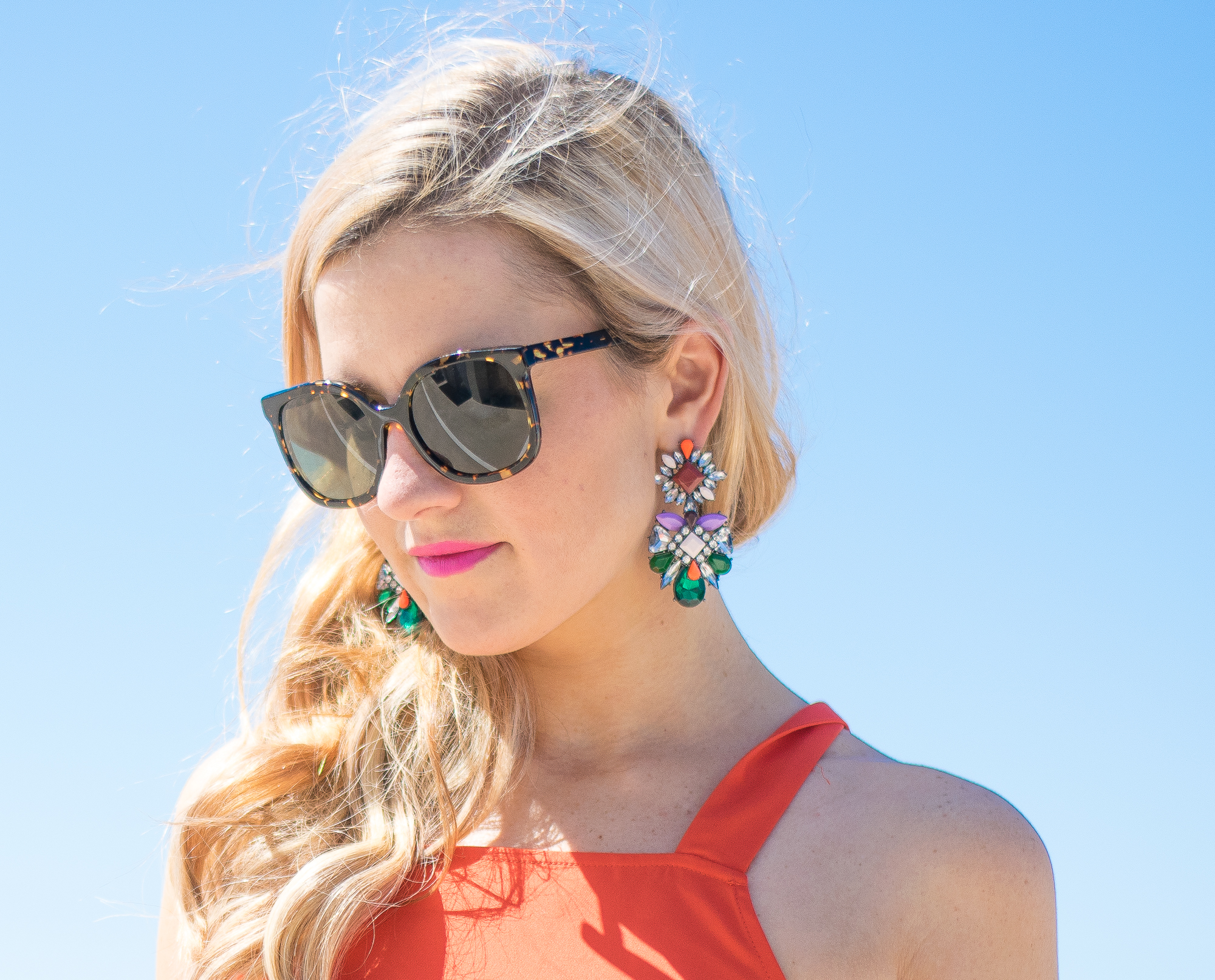 orange statement earrings