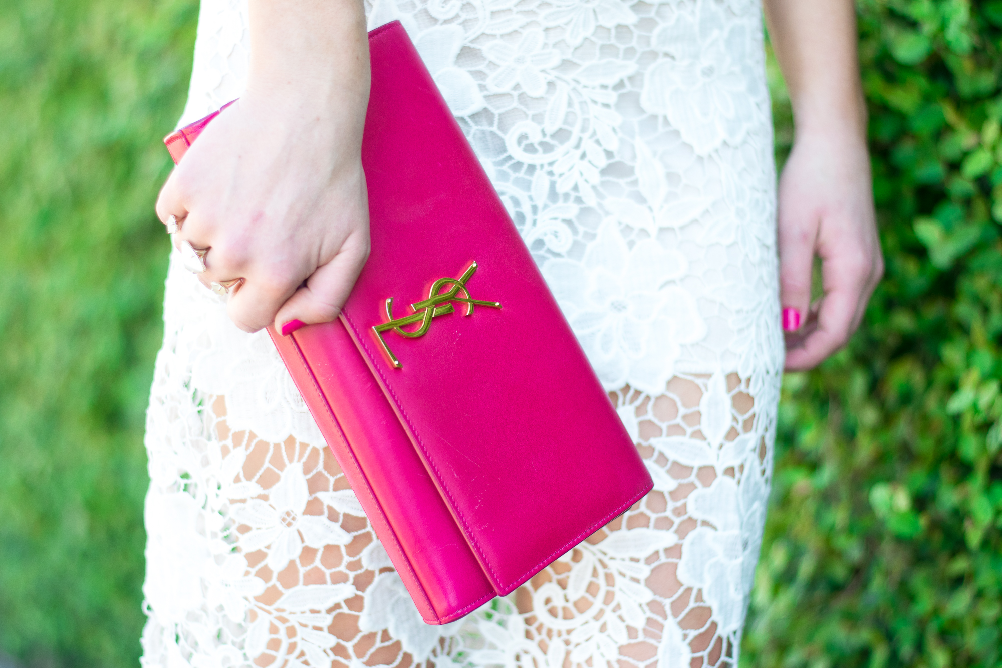 pink YSL clutch
