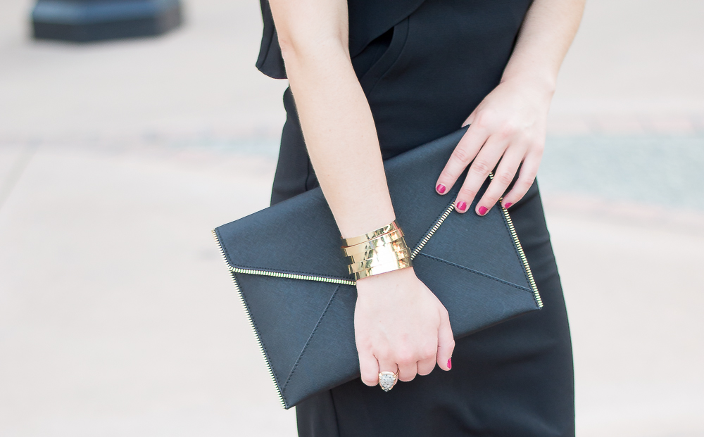 Rebecca Minkoff black and gold clutch