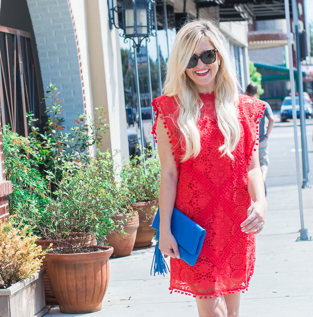 red dress blue clutch