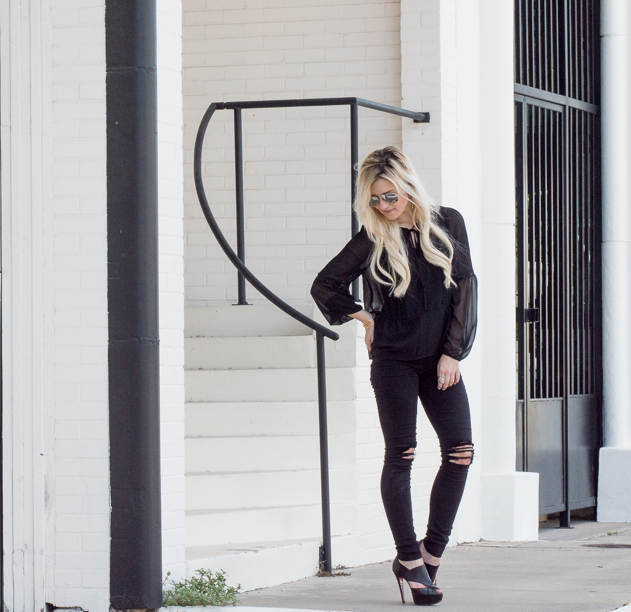 black sheer blouse ripped black jeans