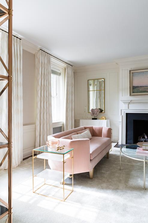 pink-velvet-curved-sofa-glass-brass-tiered-end-tables