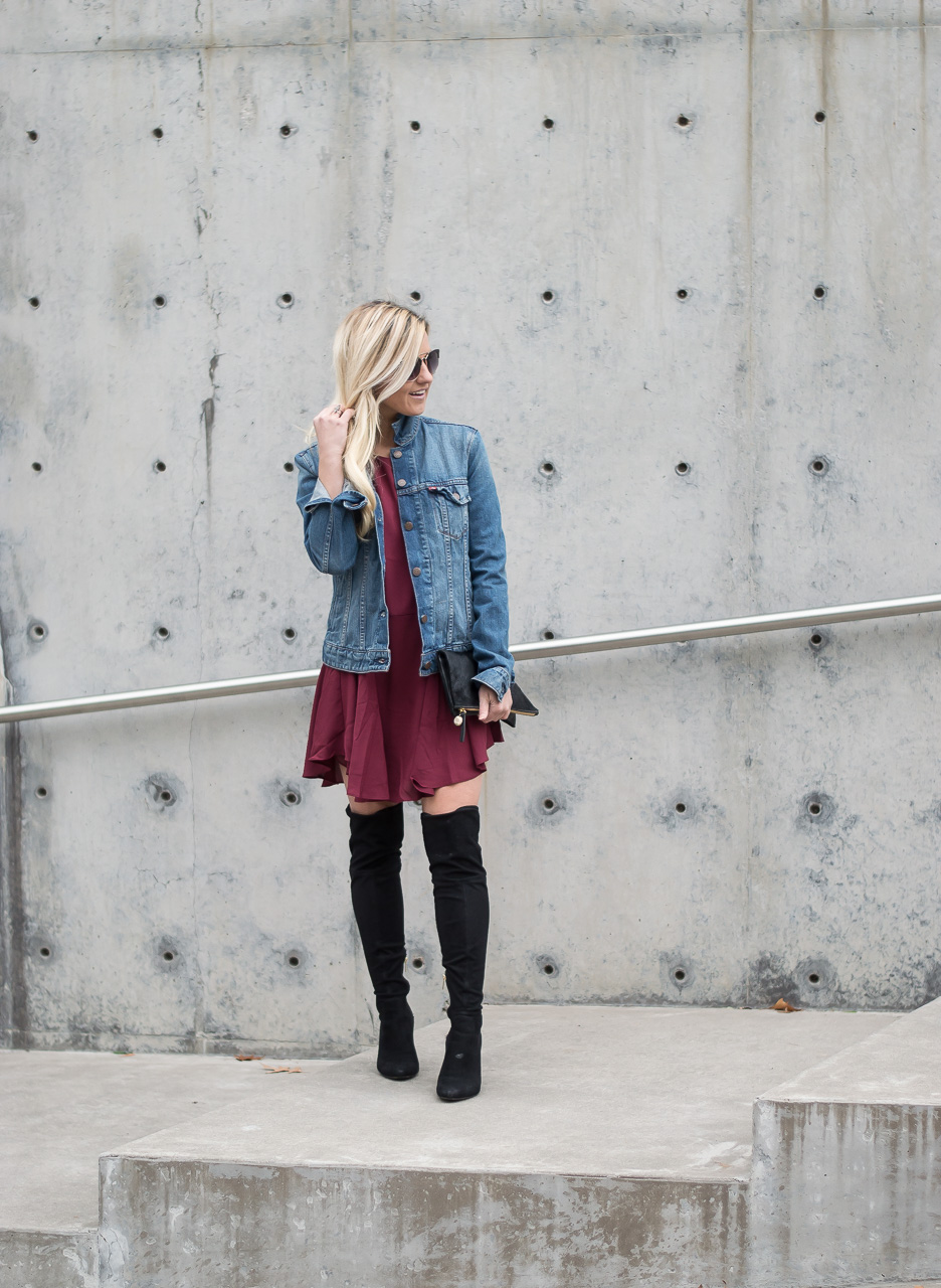 denim jacket over red dress