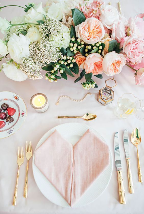 feminine gold flatware pink table setting