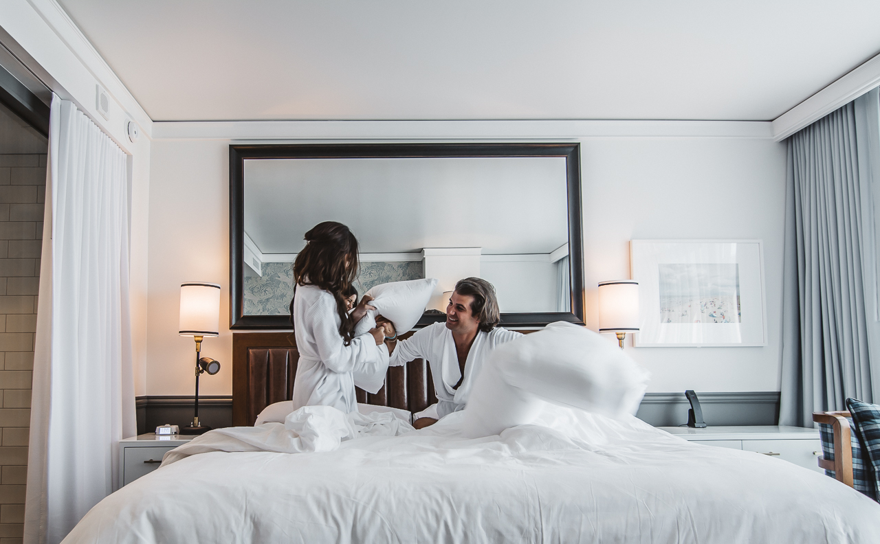 Pillow Fight Couple Hotel Bed