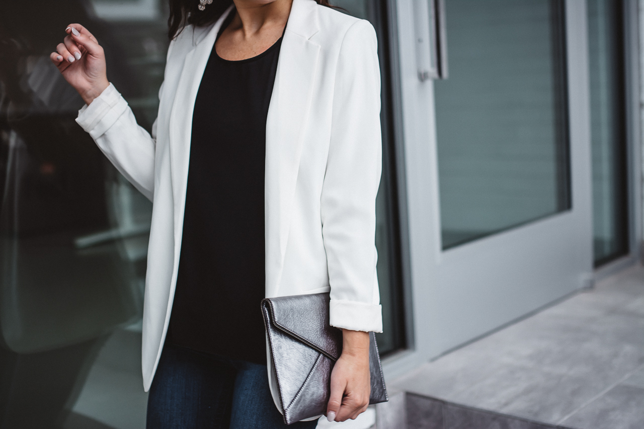 white blazer black tank