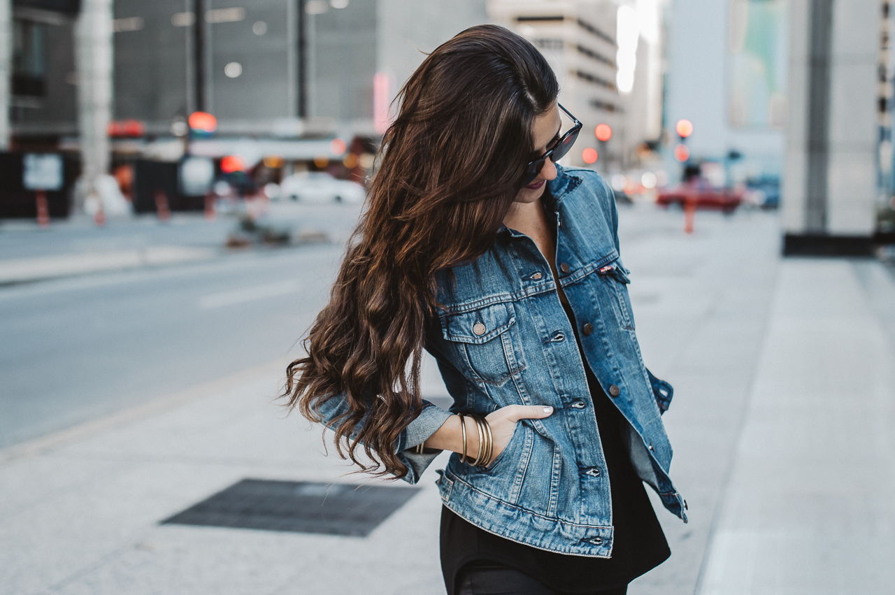 denim jacket with dress and sneakers
