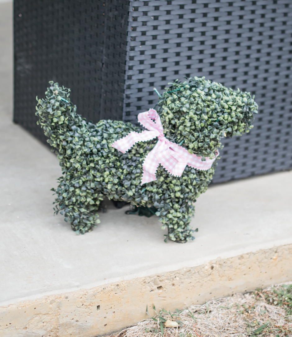 green topiary dog