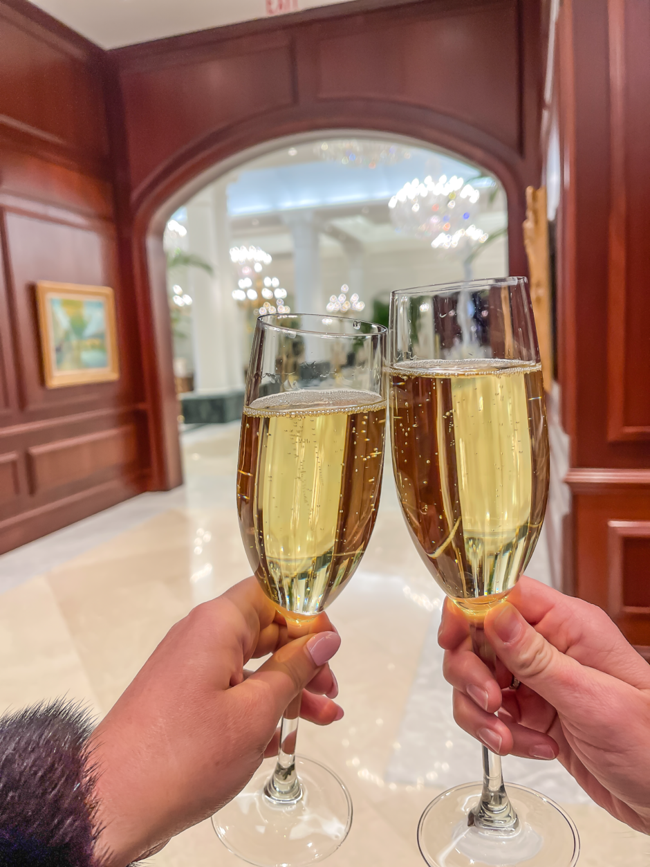 Scenic view of Nemacolin luxury resort surrounded by rolling hills and lush forest in southwestern Pennsylvania.